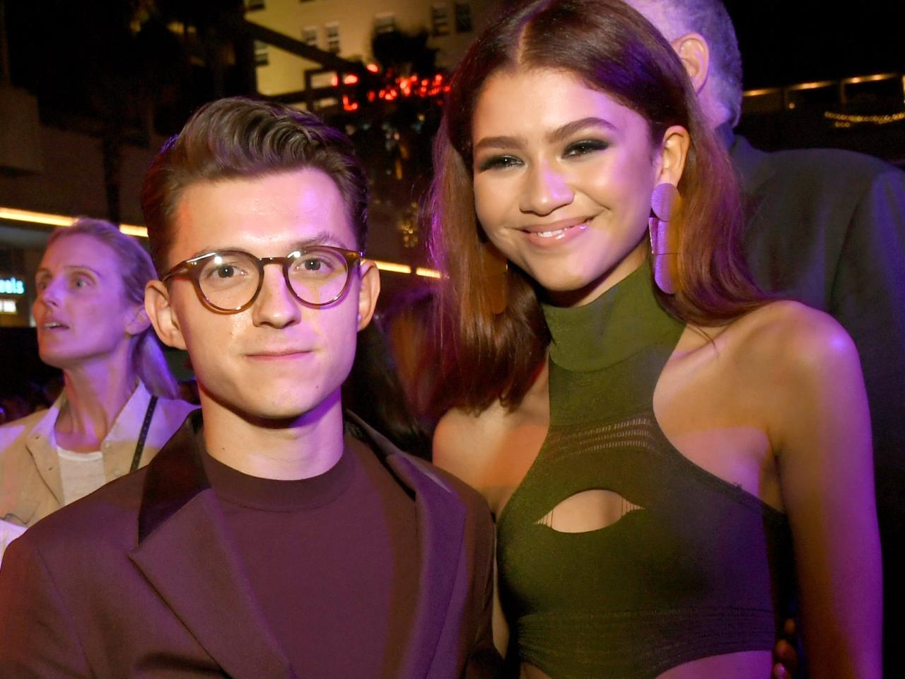 Tom Holland says he and Zendaya 'felt robbed of our privacy' after  paparazzi photos of them kissing went viral