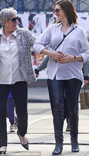 Joy: Mom and daughter looked at each other and grinned as they appeared to feel the baby move