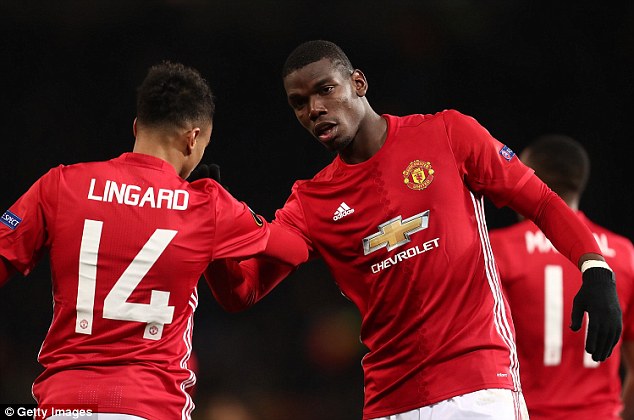 Paul Pogba celebrates one of his goals against Fenerbahce in style with Lingard on Thursday