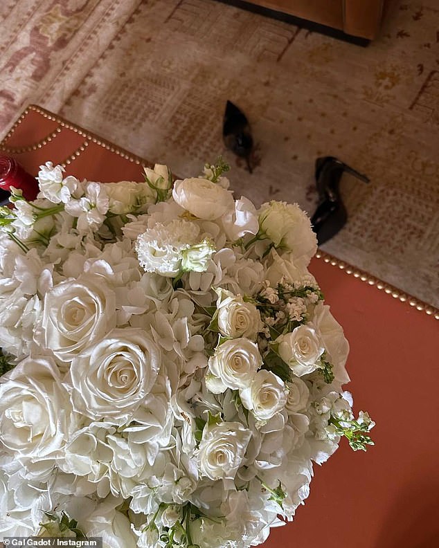 Treat: The final snaps from the post featured a stunning view from the boat and finally a bouquet of white roses