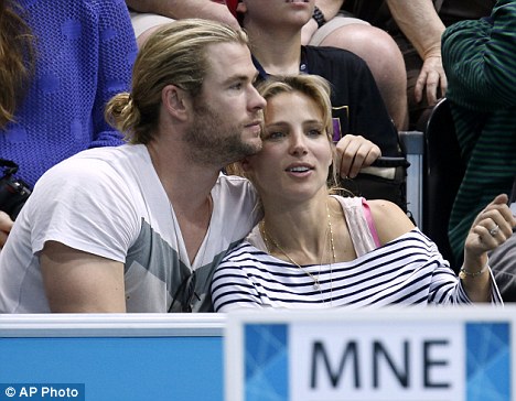 As loved up as ever: The Thor star and Elsa dressed casually as they got involved with the sporting extravaganza