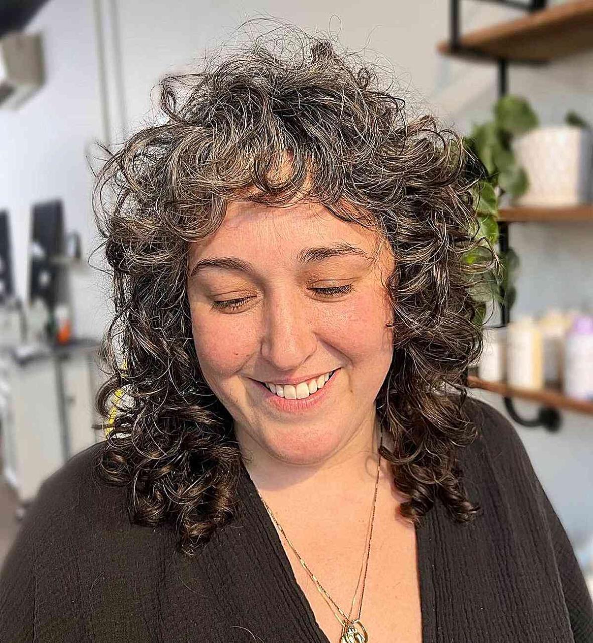 Short to Medium Textured Cut with Curly Bangs